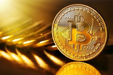 "Bitcoin"in dəyəri 18 min dolları ötdü