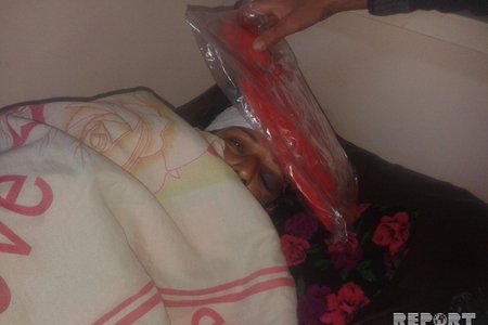 Ucarda ər arvadını baltalayıb - FOTO